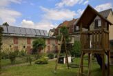 Halle-Bruckdorf: Mehrfamilienhaus mit Garten und Nebengelass - Bild1