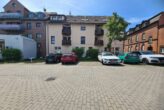Bitterfeld-Wolfen OT Zörbig: Eigentumswohnung, vermietet an Arztpraxis, Bruttorendite 7,5 %, mit Aufzug und 3 PKW-Stellplätzen - Bild2